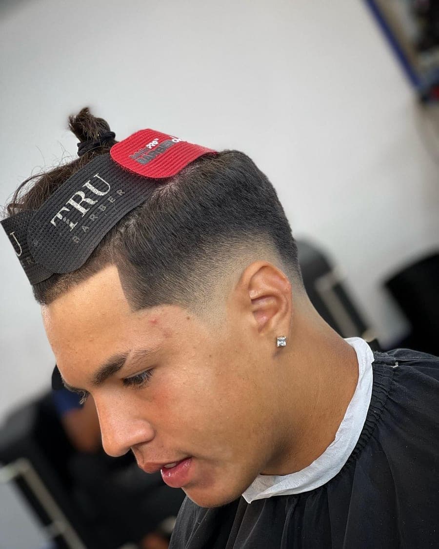 Sharp line-up with a mid fade