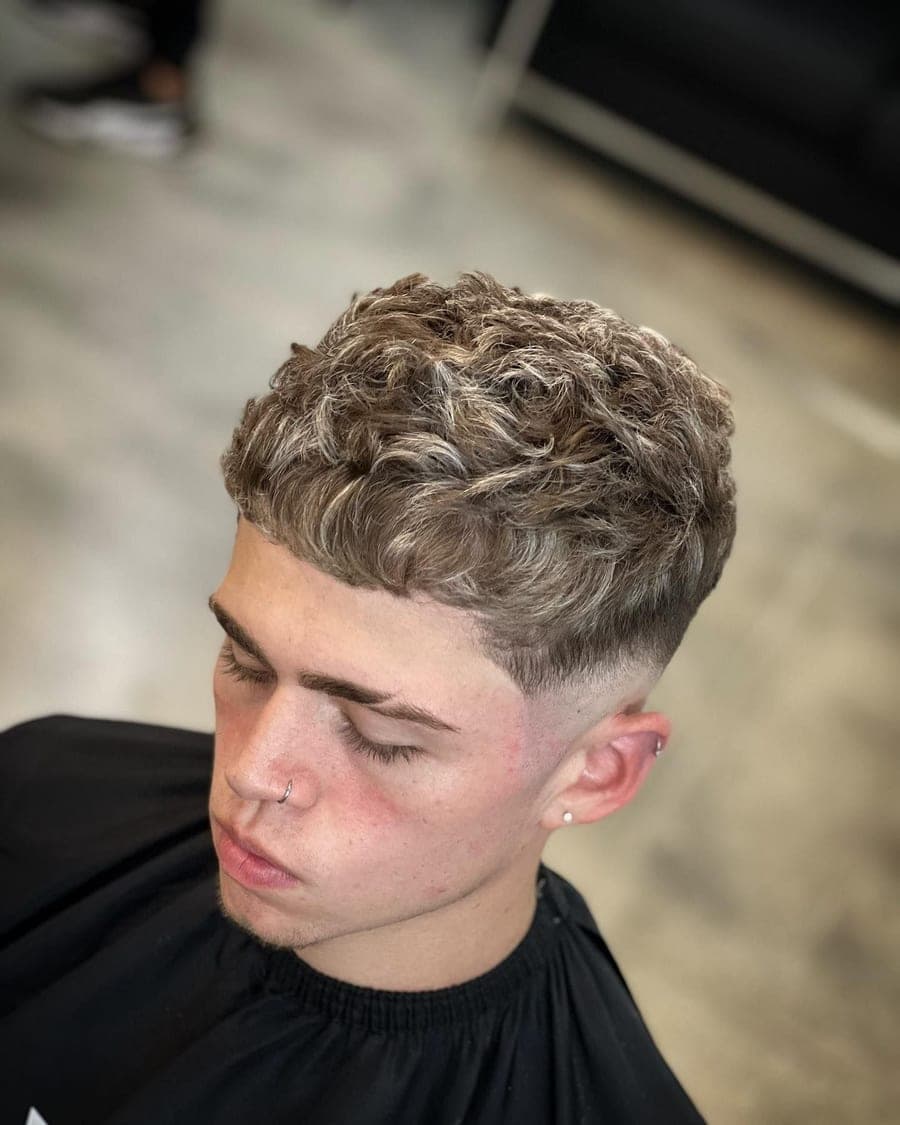 Blond textured crop over a low fade